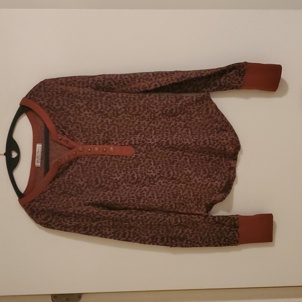 Free People long sleeve ribbed leopard print shirt. Henley style.
